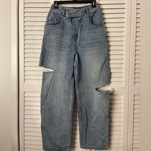 Asymmetric cut wide legged jeans